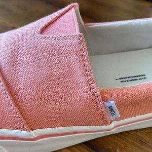 Tom’s Fenix slip on, peach-pink. Brand new, I wore them once.